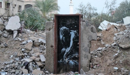 الشرطة في غزة تصادر لوحة بانسكي من مشتريها وخلاف قانوني بين المشتري والبائع