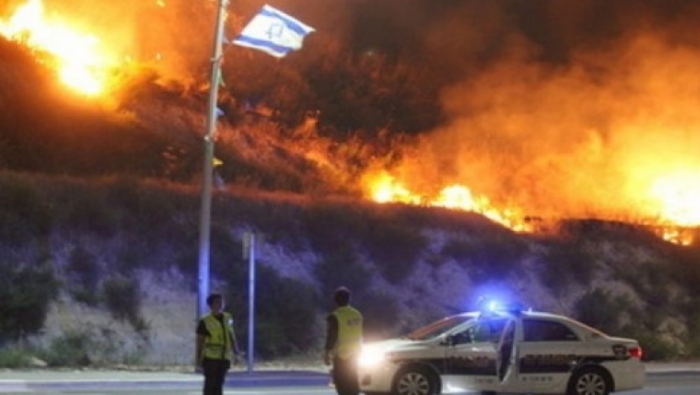 القناة العبرية الثانية: الشاباك يعلن أن الحرائق نتيجة عملية 