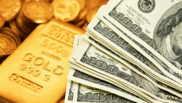 الفائدة الأمريكية تهوي بالدولار والذهب عند مستويات متدنية