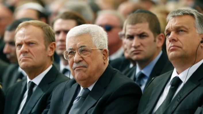 تعقيب فتح على مشاركة الرئيس عباس في جنازة بيريس