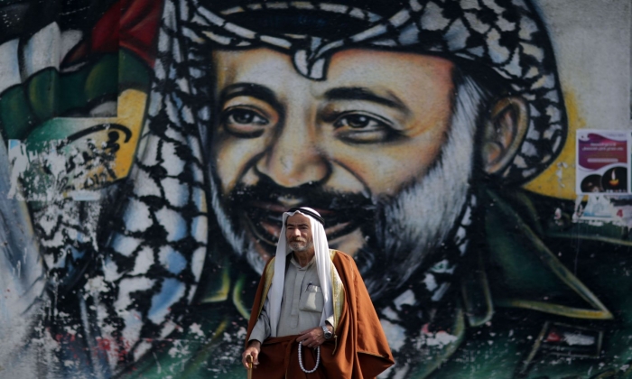 فتح: الوفاء للرئيس الراحل عرفات يكون بالوحدة وحب العلم الفلسطيني 