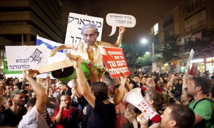 الآف من المتظاهرين في تل أبيب يطالبون برحيل نتنياهو