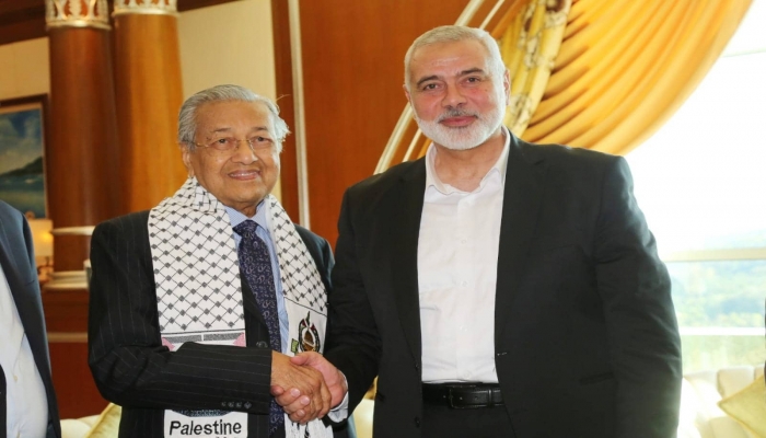 تفاصيل اجتماع هنية مع رئيس وزراء ماليزيا مهاتير محمد
