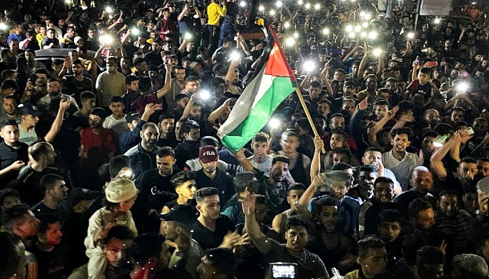 حماس:  نحن مطالبون بتعزيز نسيج الوحدة الوطنية 

