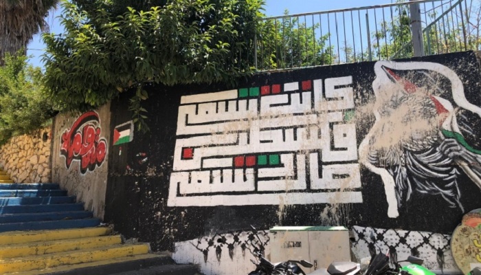 الحراك النصراوي يدعو لإعادة رسم الجداريات التي شوهها المستوطنون
