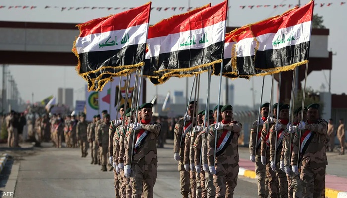 العراق يعيد مئات
