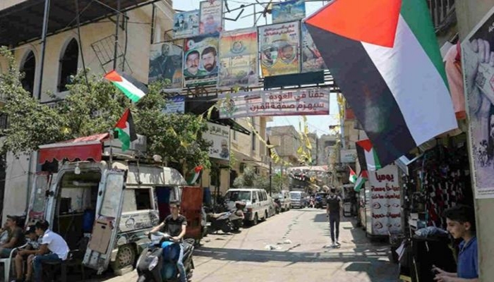 أبو ردينة: البدء بتسليم السلاح الموجود داخل المخيمات الفلسطينية في لبنان للجيش اللبناني
